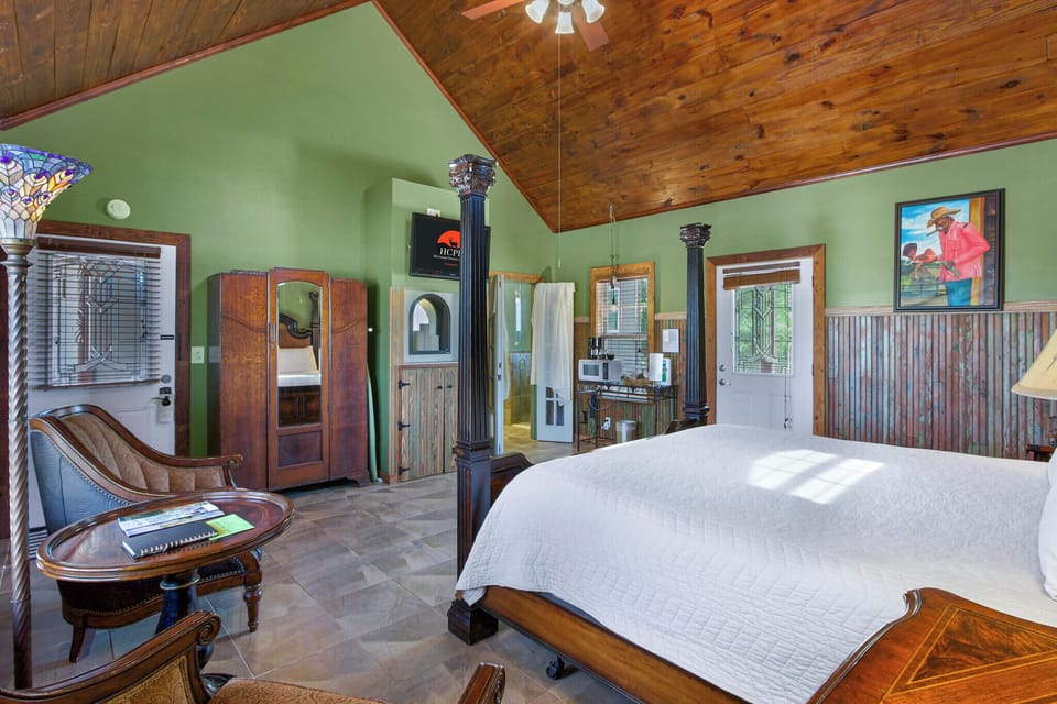 View looking toward the entrance to the bathroom.  Also, you can see the coffee bar and exit to the private back porch on the cottage.