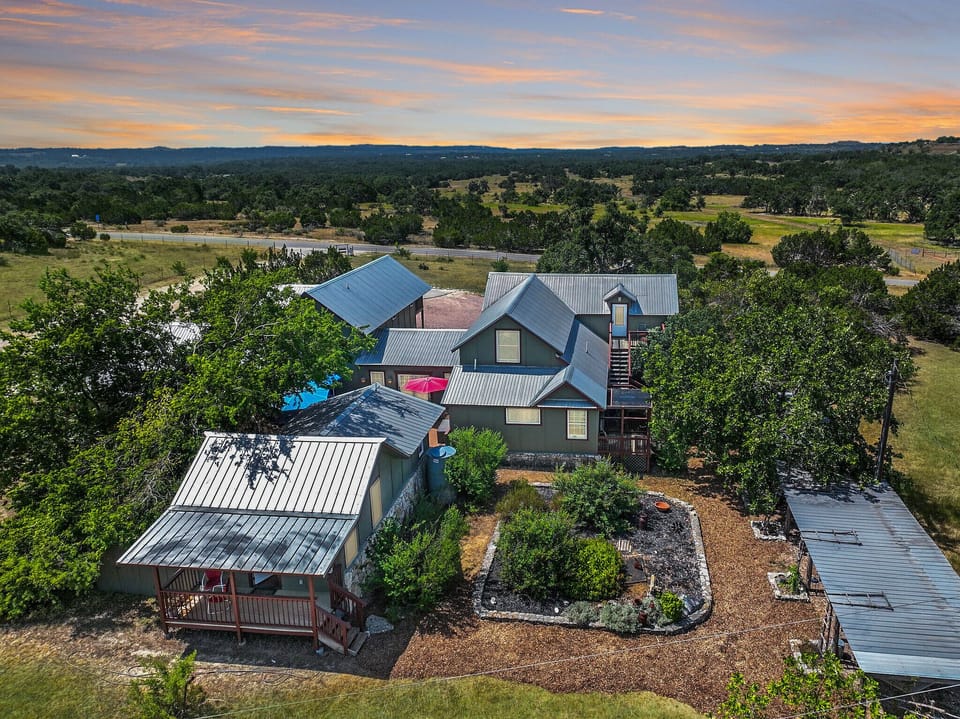 Rockin Boots Cottage is part of the much larger Swing On Property.  It is the furthest back cottage on the property and can be seen in the bottom left of this picture.