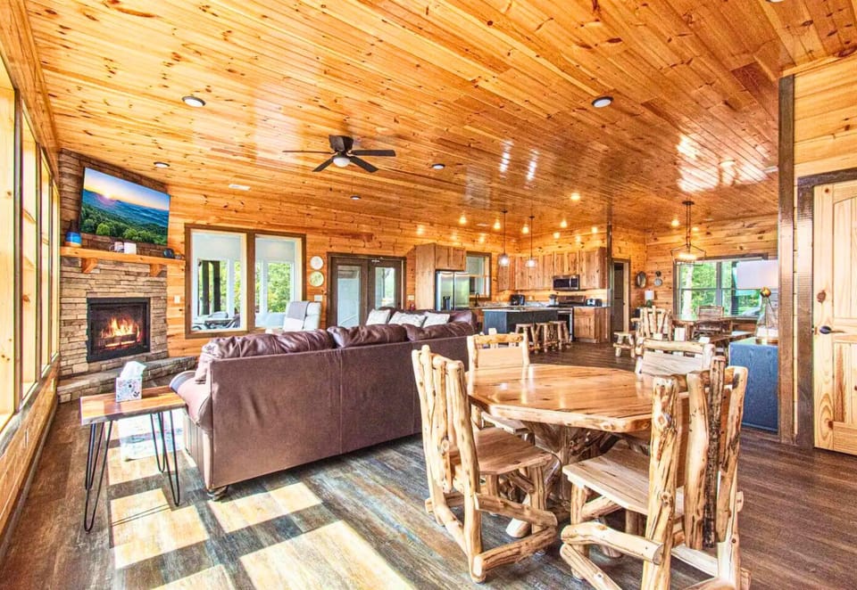 Open Concept Floor Plan on the Main Level Throughout the Living Room, Dining Area and Kitchen