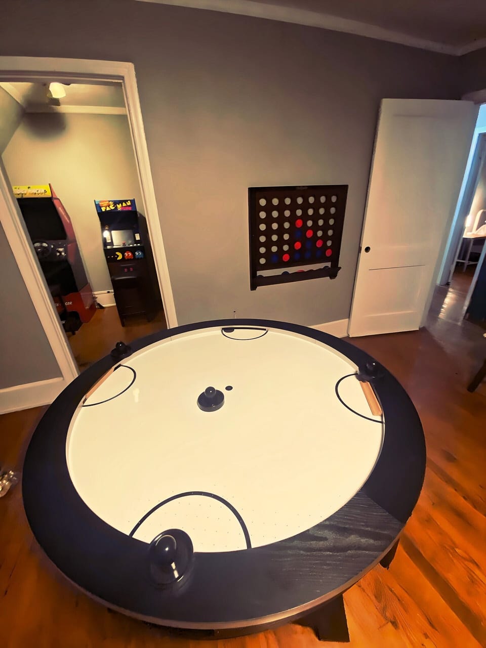 The gameroom also features wall mounted connect 4 game & ring toss game.