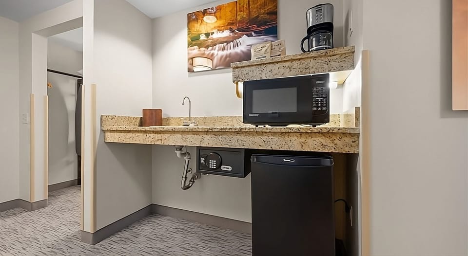 Grab a quick snack with fridge, microwave, and coffeemaker.