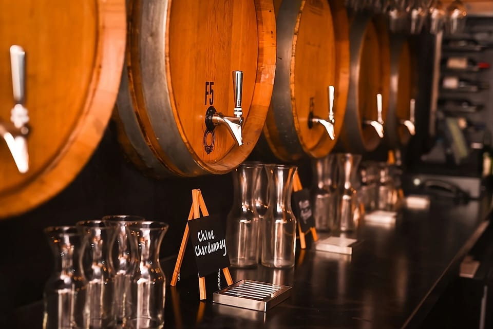 Savor local tastings poured fresh from oak barrel taps.