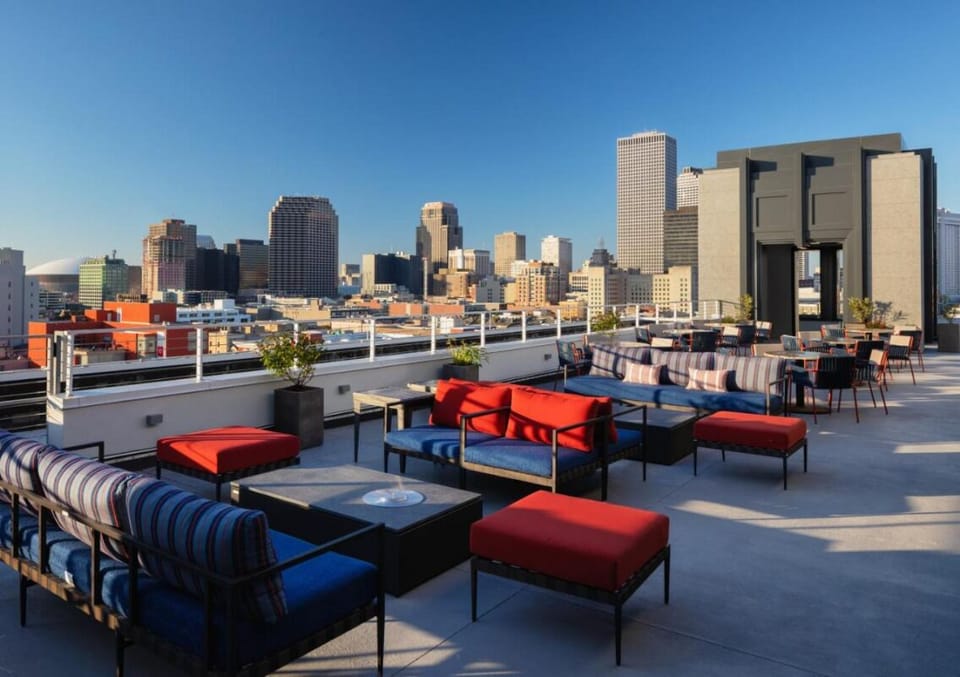 Soak up skyline sunsets from the rooftop lounge with friends.