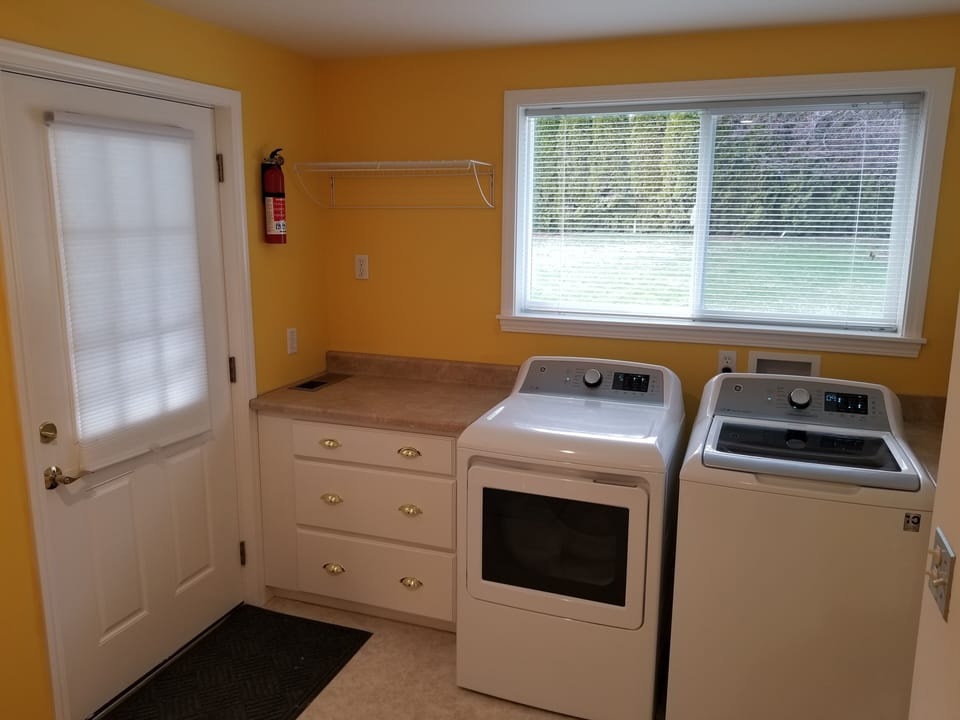 On Second/Main Floor Laundry Room. it does have entrance to Backyard.
