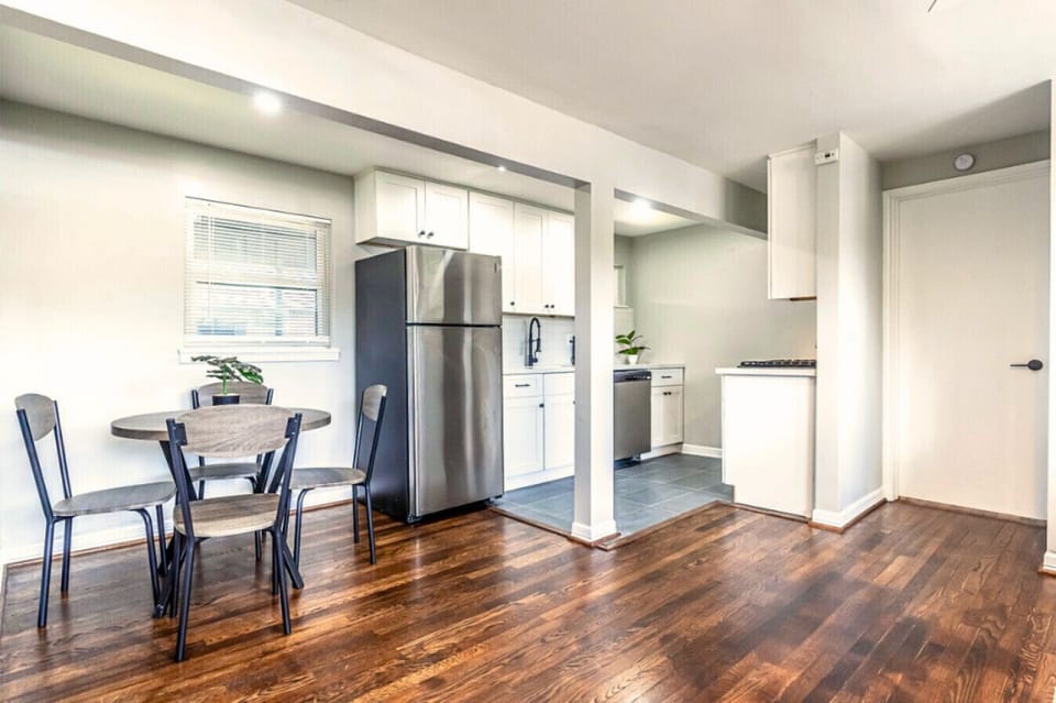 Bright and open kitchen with a cozy dining nook—great for meals at home.