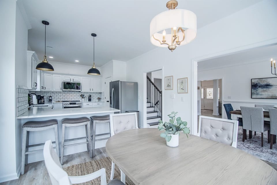 Another view from eat in kitchen to kitchen area