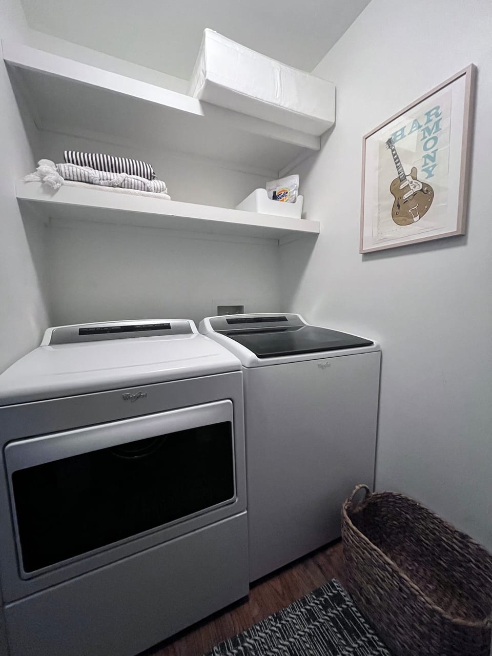 Laundry room with detergent provided. 