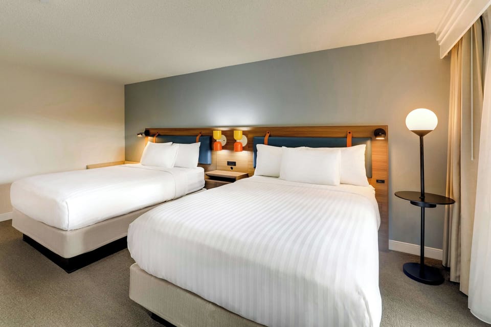 Drift off peacefully in a serene room with warm lighting.