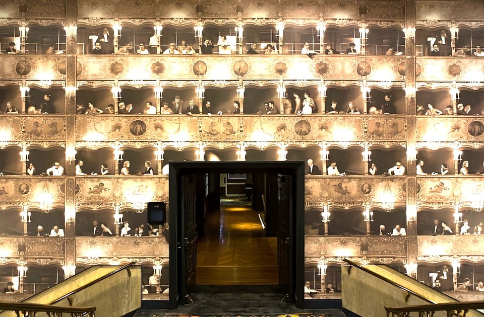 Step into a dramatic, art-filled lobby corridor and explore.