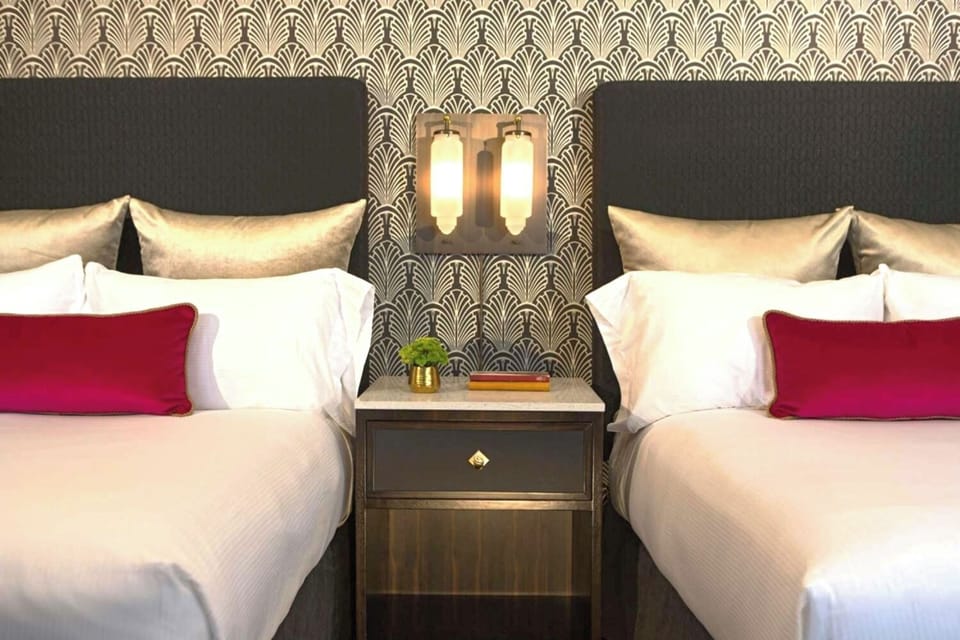 Settle in comfortably with two plush beds and soft lighting.