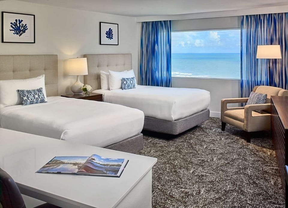 Stretch out and savor sweeping ocean views from bed.