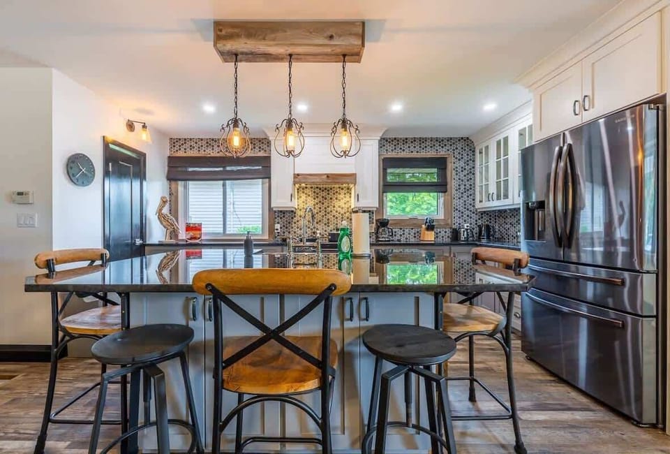 Our kitchen has a beautiful island with additional seating. 