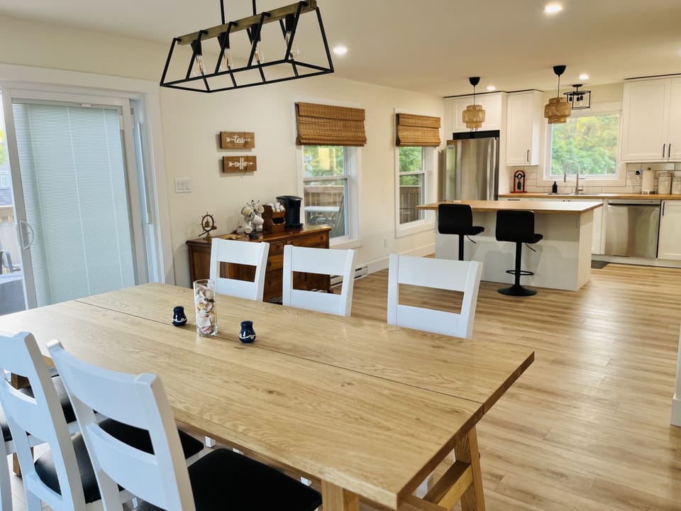 Open concept kitchen and dining room table