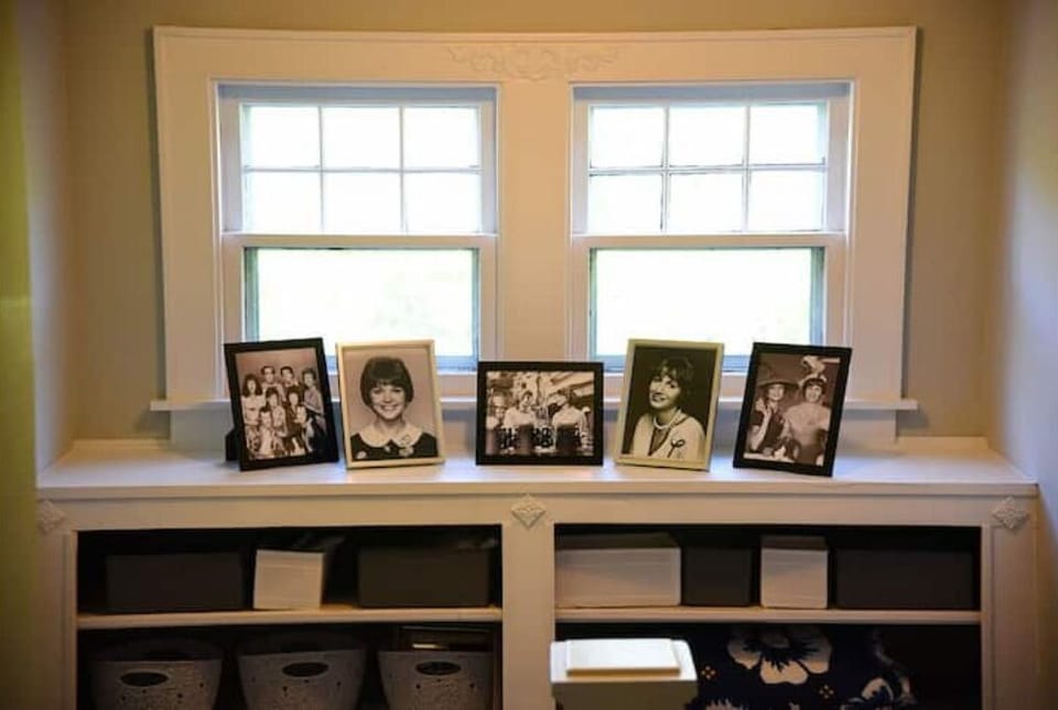 Here find extra linens, bathroom necessities, and pics of Laverne & Shirley