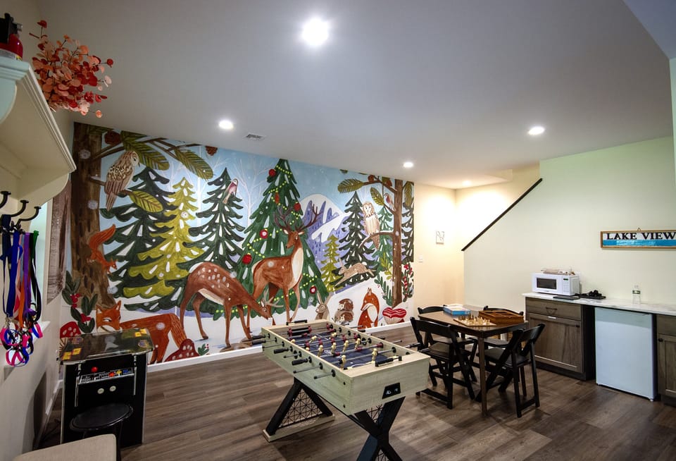 Game Room: Unleash your inner child with foosball, fun decor, and nature-inspired artwork!