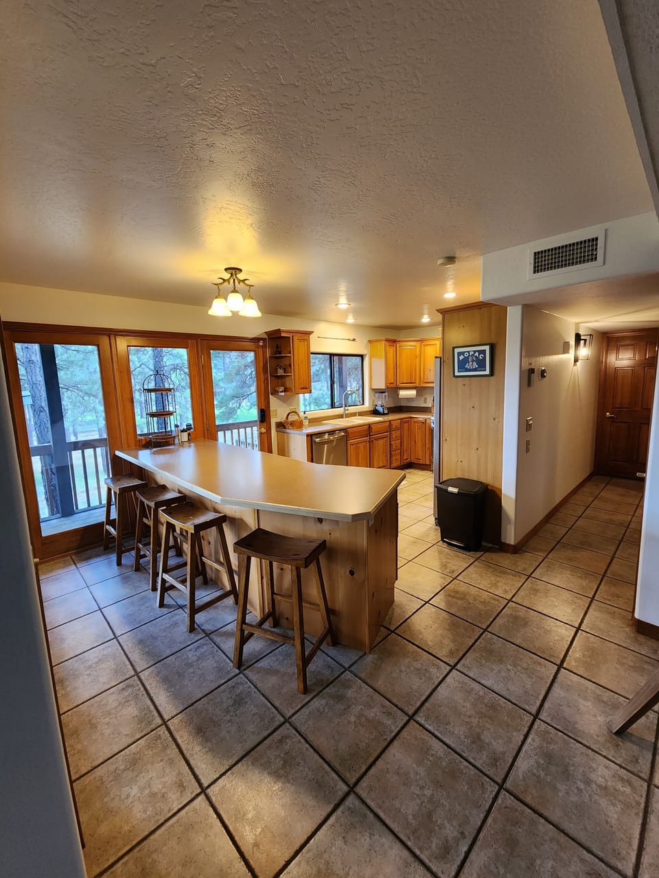 Spacious kitchen w plenty of room for more than one chef.