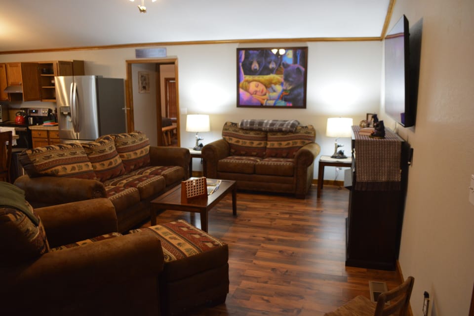 Family Room with 65 inch Roku T.V. and Gas Fireplace