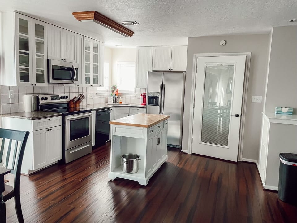 Open kitchen allows visiting with family while cooking your favorite meal!