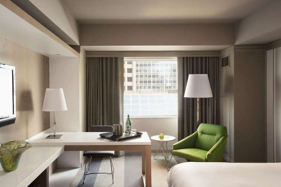 Settle in at the desk, then lounge by the window.