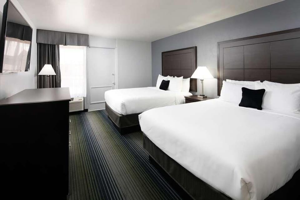 Spread out comfortably with two beds and warm bedside lighting.