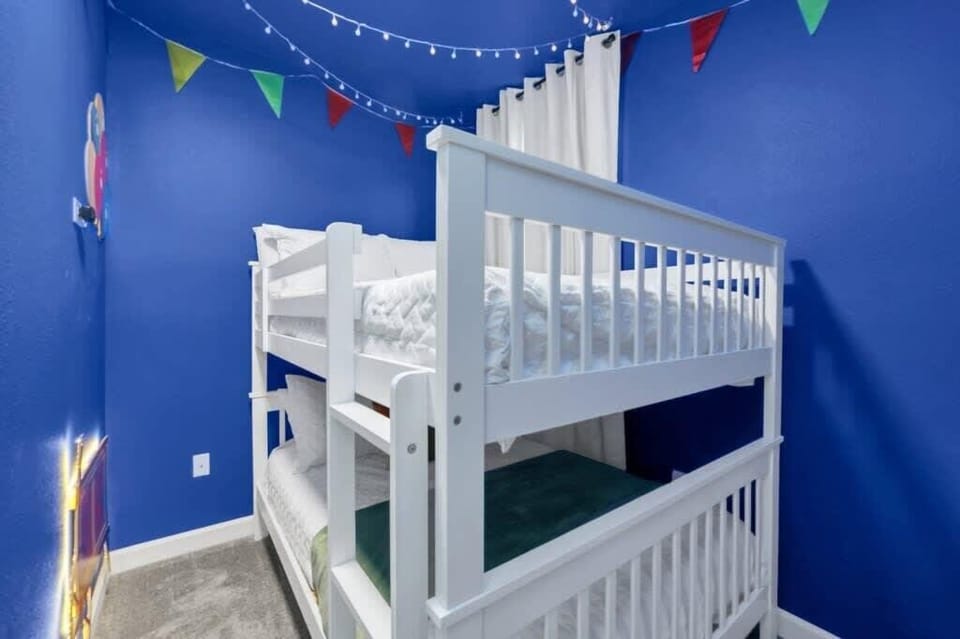 Kids will love this fun Toy Story Themed bunk bedroom featuring cozy bunk beds, a flat-screen TV, high-speed Wi-Fi, and the perfect space to relax, laugh, and hang out together.