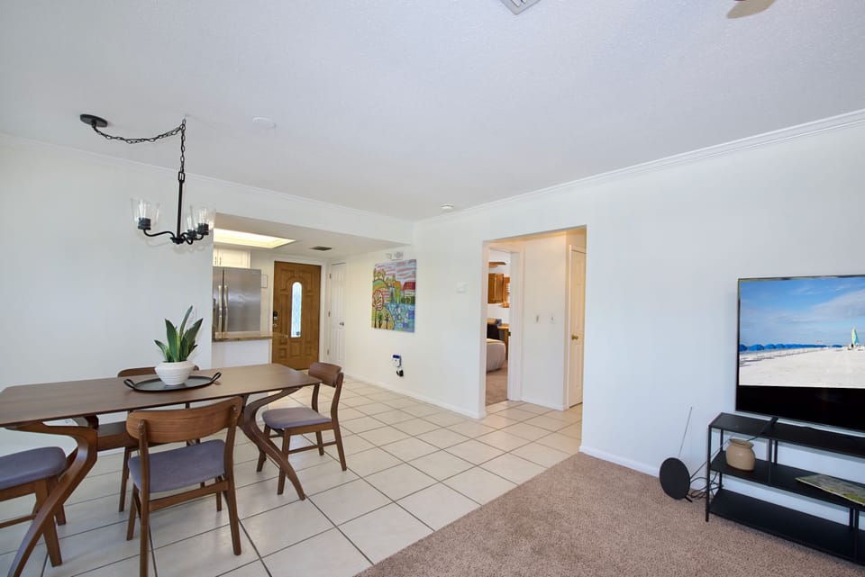Dining area in hallway to bedrooms and bath