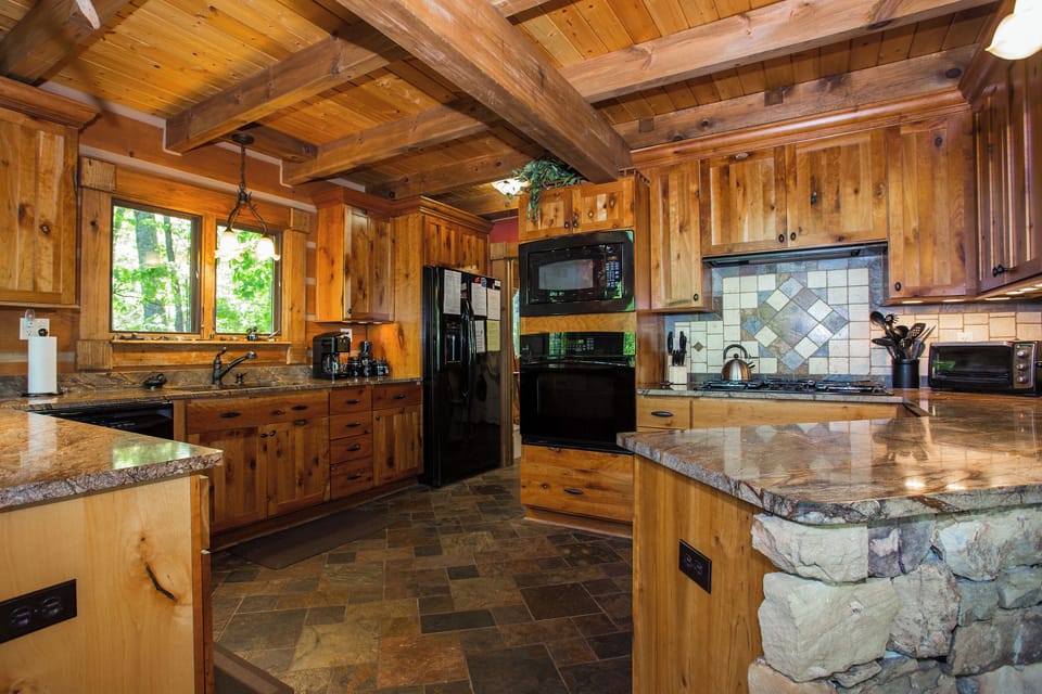 Well-equipped kitchen overlooking the living room and dining area