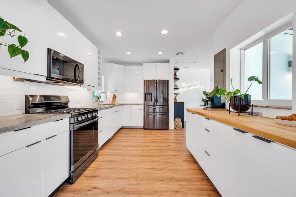 Culinary Haven Awaits: Step into Our Chic and Fully Equipped Kitchen, Where Gourmet Creations Come to Life. A Space That Pairs Functionality with Aesthetic Delight.