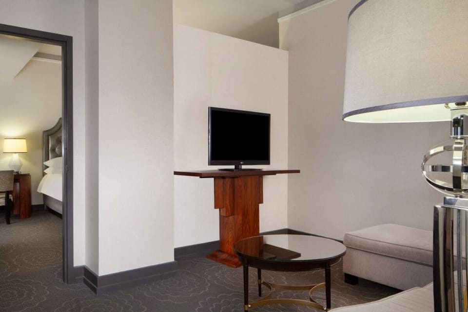 Relax on the sofa with a simple, airy living space.