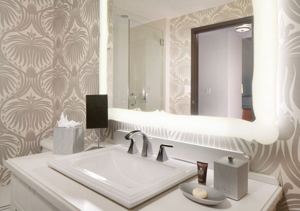 Pamper yourself at the glowing mirror with spa-like finishes.
