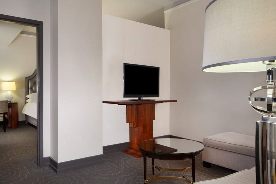Relax on the sofa with a simple, airy living space.