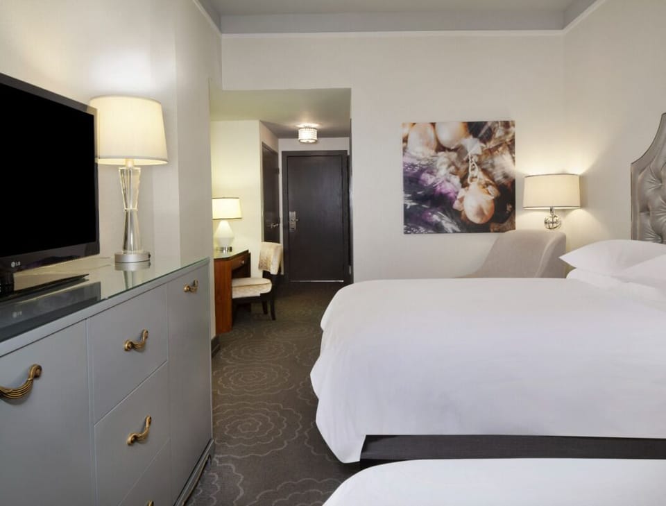 Recharge in a calm, spacious room with soft evening light.