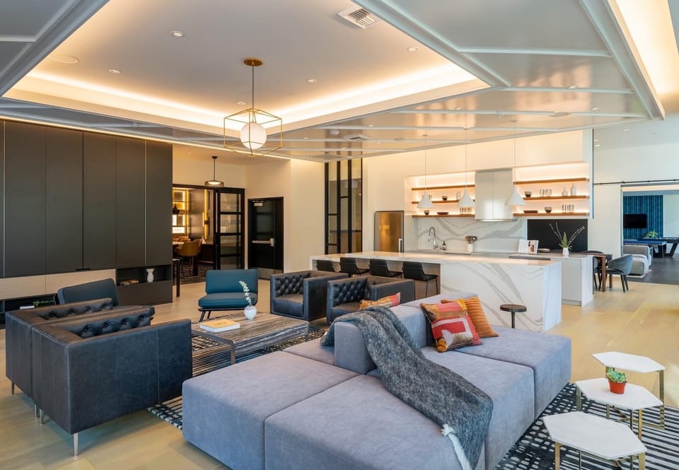 Club Lounge with gaming Area, Kitchen/Dinning, and Seating Area.