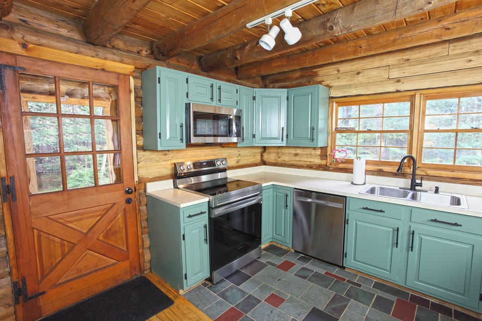 Fully stocked kitchen. The grill is right outside this back door. 