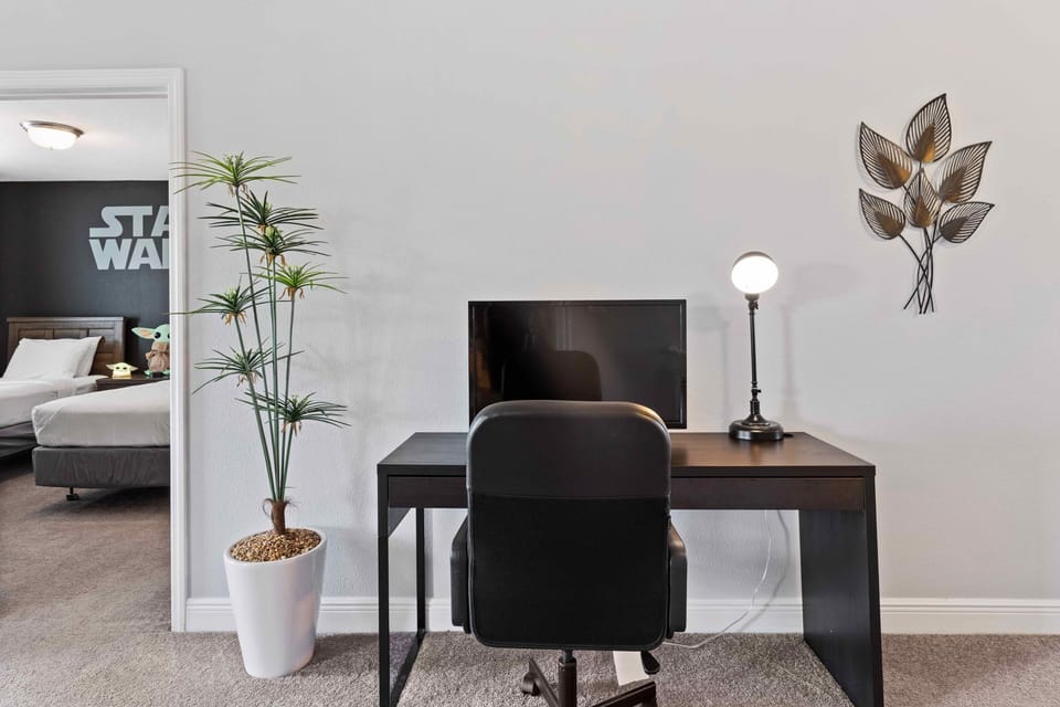 Dedicated work desk of the home in Davenport Florida - Stylish, contemporary furnishings enhancing the aesthetic - Well-planned layout maximizing comfort and functionality