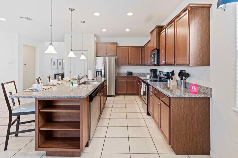 Kitchen magic: Experience convenience and style in our fully equipped kitchen.