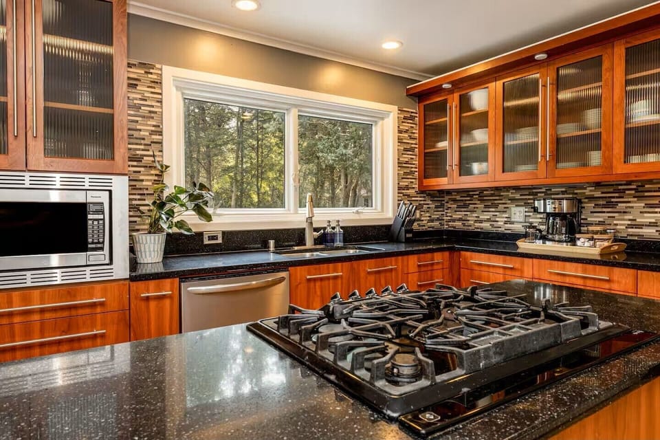 Fully equipped kitchen with modern appliances for group cooking