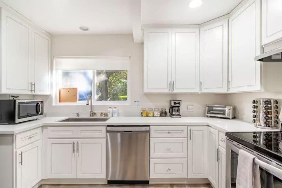 Stainless steel appliances including a basic coffee and tea bar