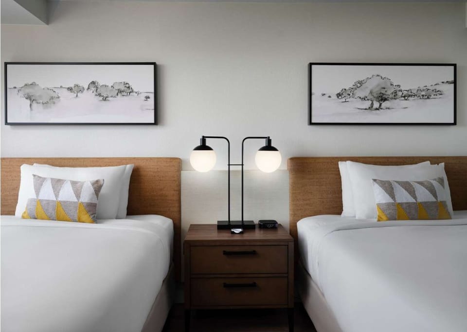 Stretch out with two plush beds and calming modern décor.