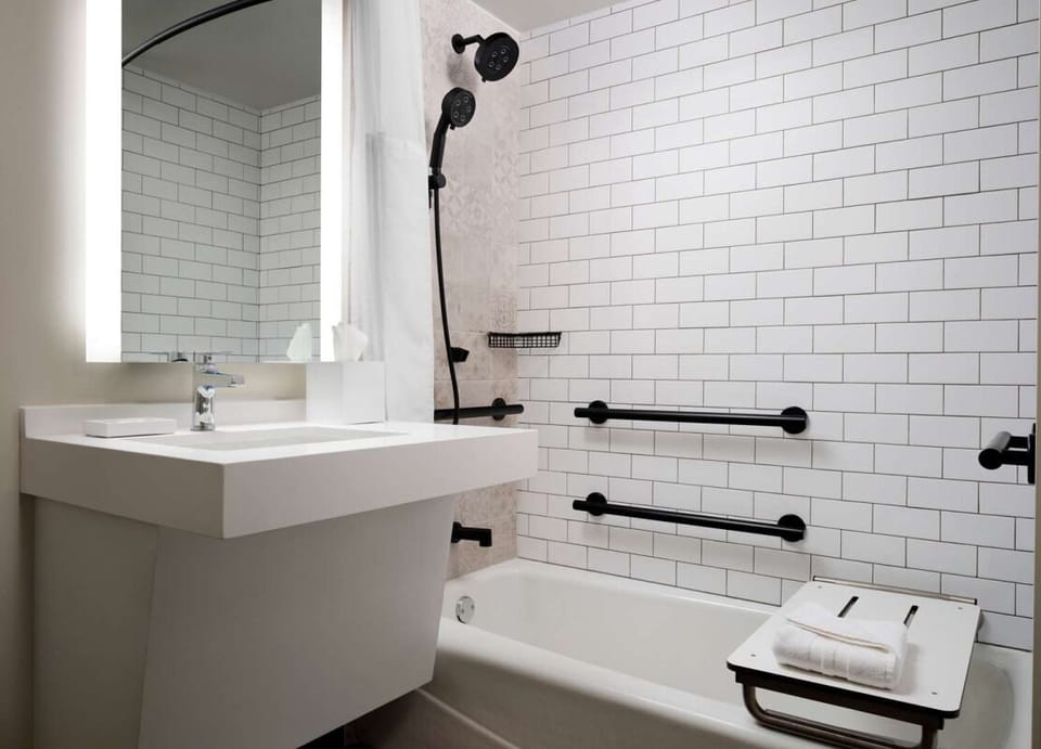 Unwind with a soothing shower-and-tub combo after exploring.