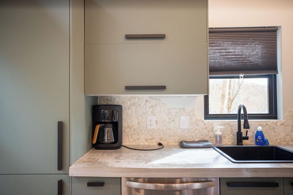 Compact and efficient space with everything you need to brew and prep.