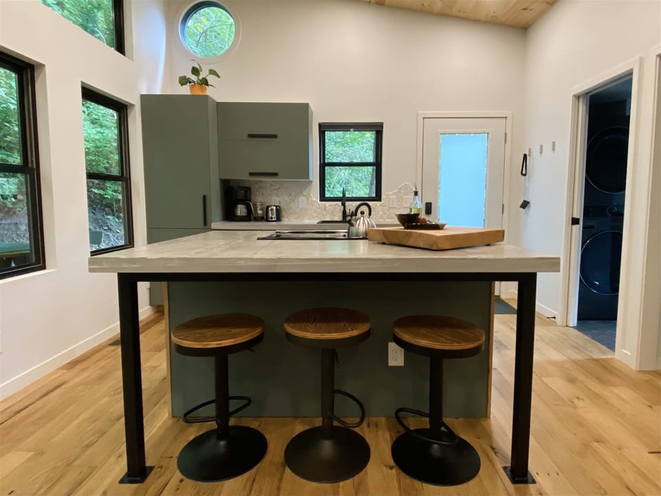 Spacious prep space and dining spot—perfect for cooking or gathering.