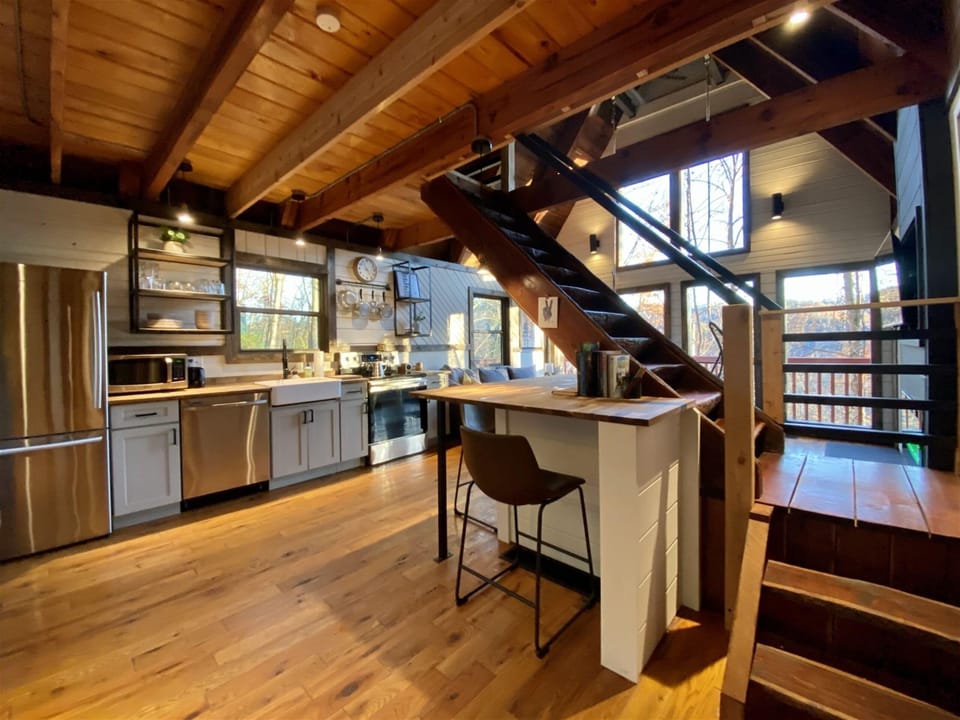 Large kitchen island for prep and dining—ideal for group meals or breakfast before a hike.