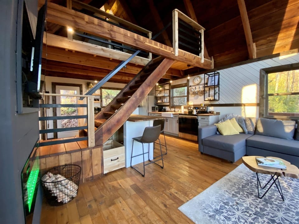 Open kitchen with wood and steel details—designed for comfort and function.
