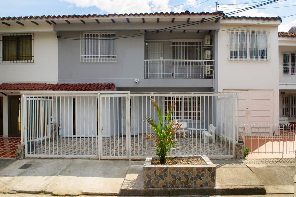 COMPLETELY REMODELED HOME WITH GARAGE AND PRIVATE SECURED COURTYARD.