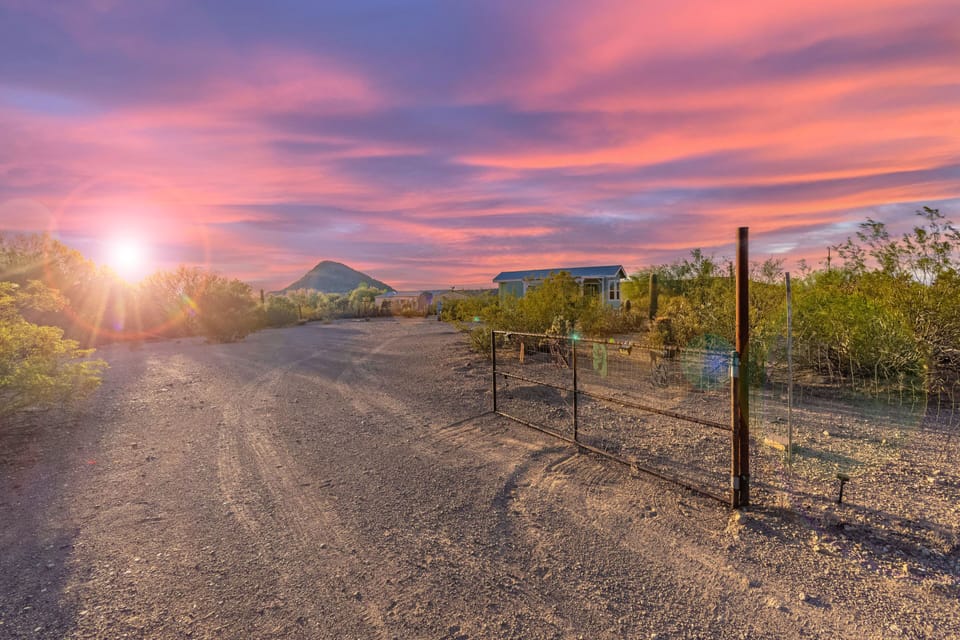 As you enter the property, you're welcomed by desert scenery and mountain views.