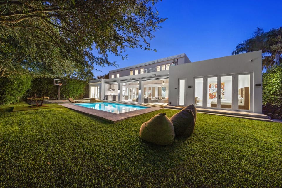 Expansive outdoor space with pool perfect for family gatherings