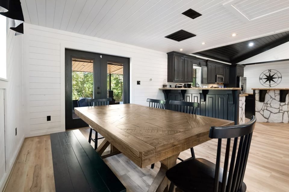 Six-person dining table with access to the patio.