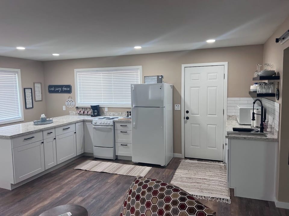 Open kitchen design. Stocked with everything you need to cook your own meals.