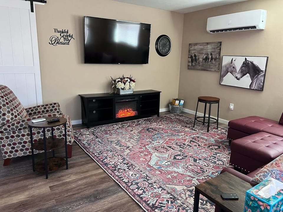 Living room, electric fireplace, Roku TV, all apps loaded ready for your log in.